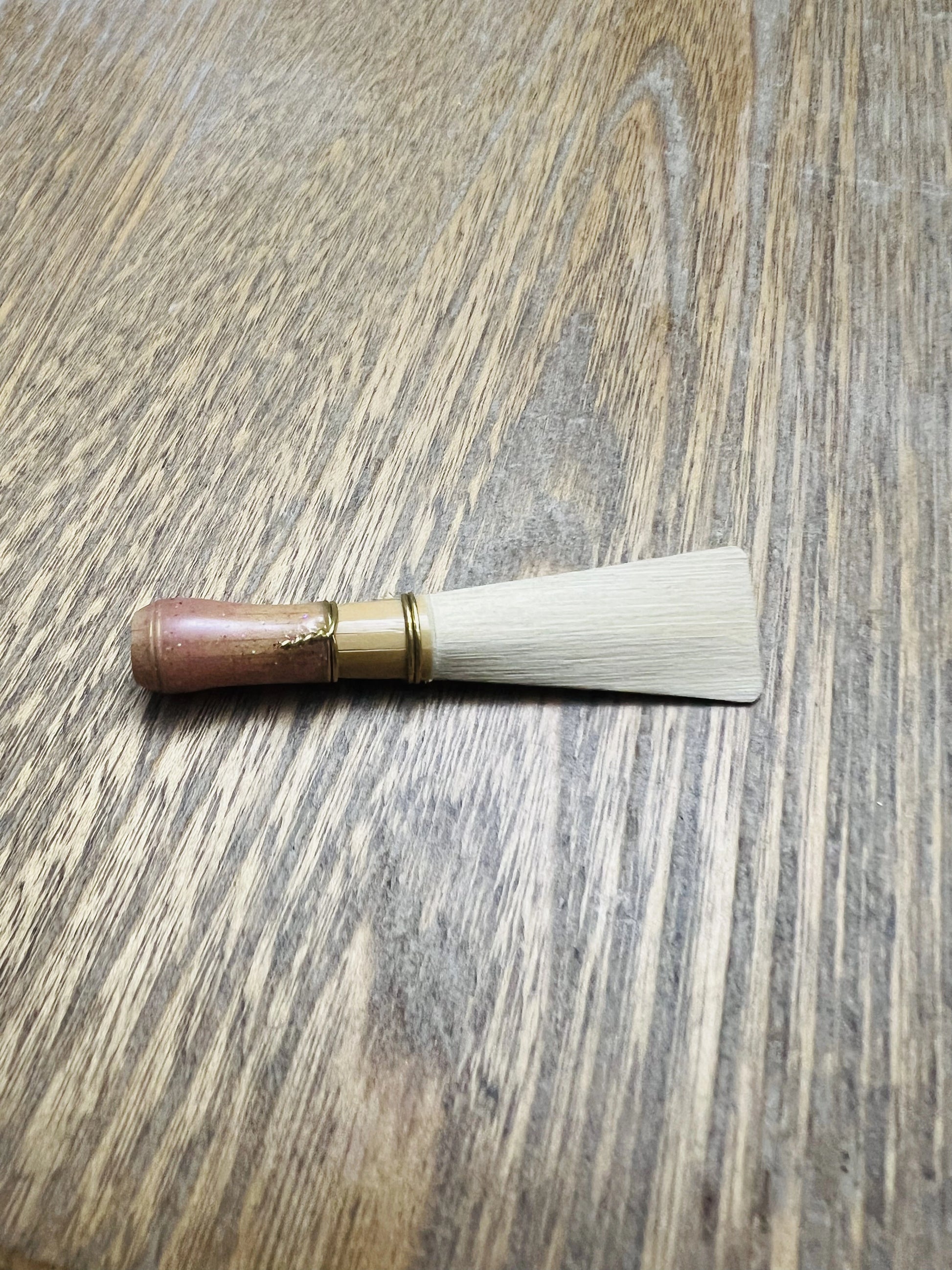 Bassoon reed blank by Harter Reed Co. showing fold and profile before scraping